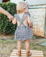 Load image into Gallery viewer, RUFFLE BUTTS Micro Stripe Woven Pinafore Cross-Back Bubble Romper
